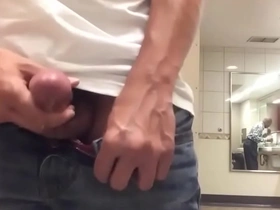 Solo boy enjoys jerking off on the toilet and finishing up with a huge cumshot.