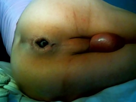Gay Asian man uses a double dildo for anal sex