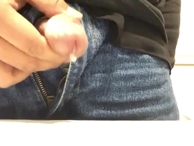 Asian guy masturbates at work and ejaculates