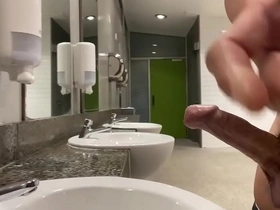 Gay solo in public restroom ends in a messy finish