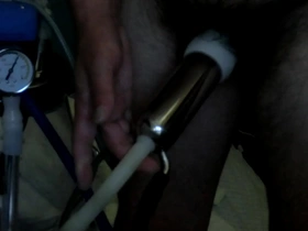 Gay masturbation with milking machine in action