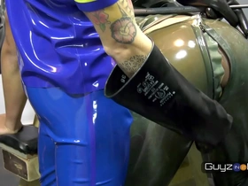 Men in rubber suits having fun