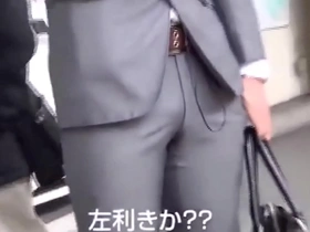 Gay man in a suit gets naughty with his Asian lover